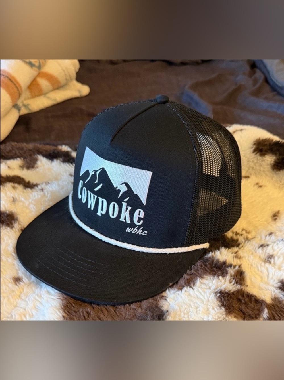 Cowpoke Trucker Hat in Black with White Logo